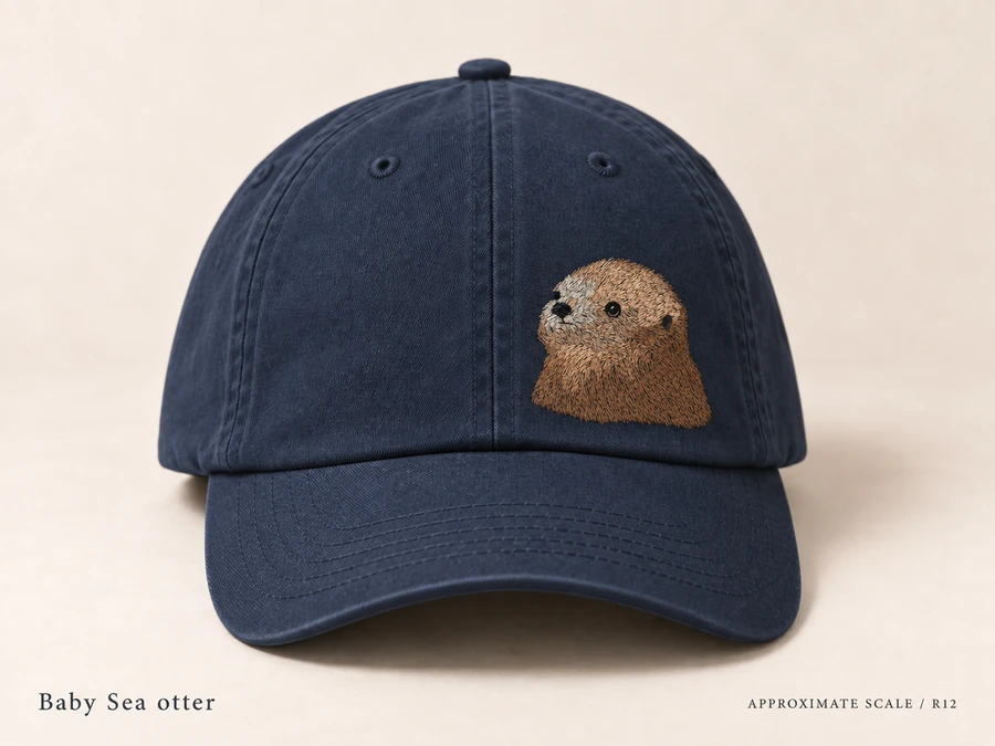 Earlier illustrative Southern sea otter cap study; superseded design