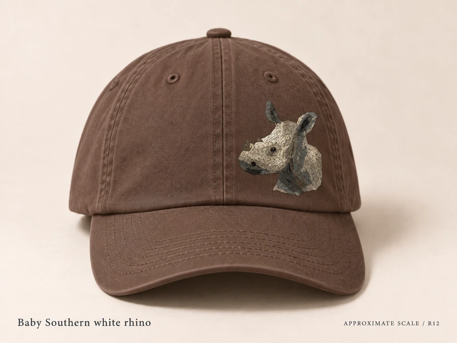 Earlier illustrative Southern white rhino cap study; superseded design
