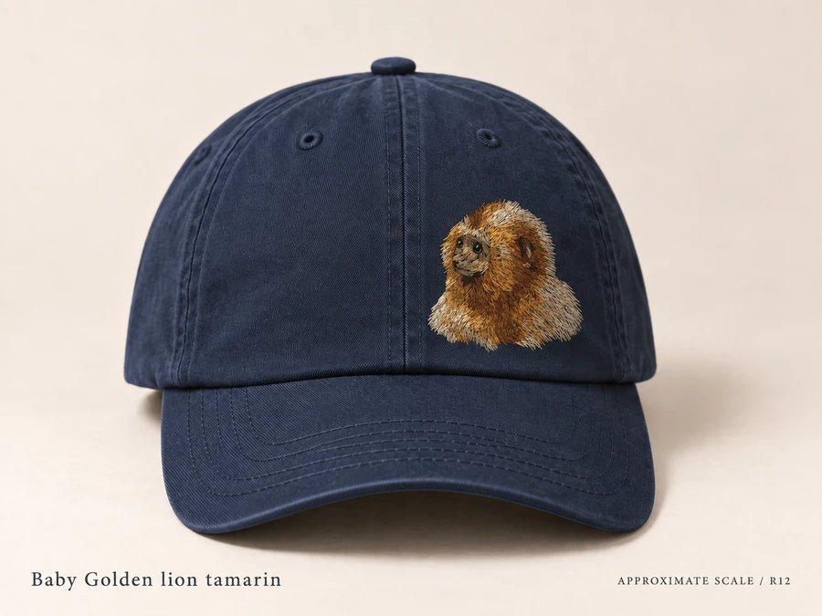 Earlier illustrative Golden lion tamarin cap study; superseded design