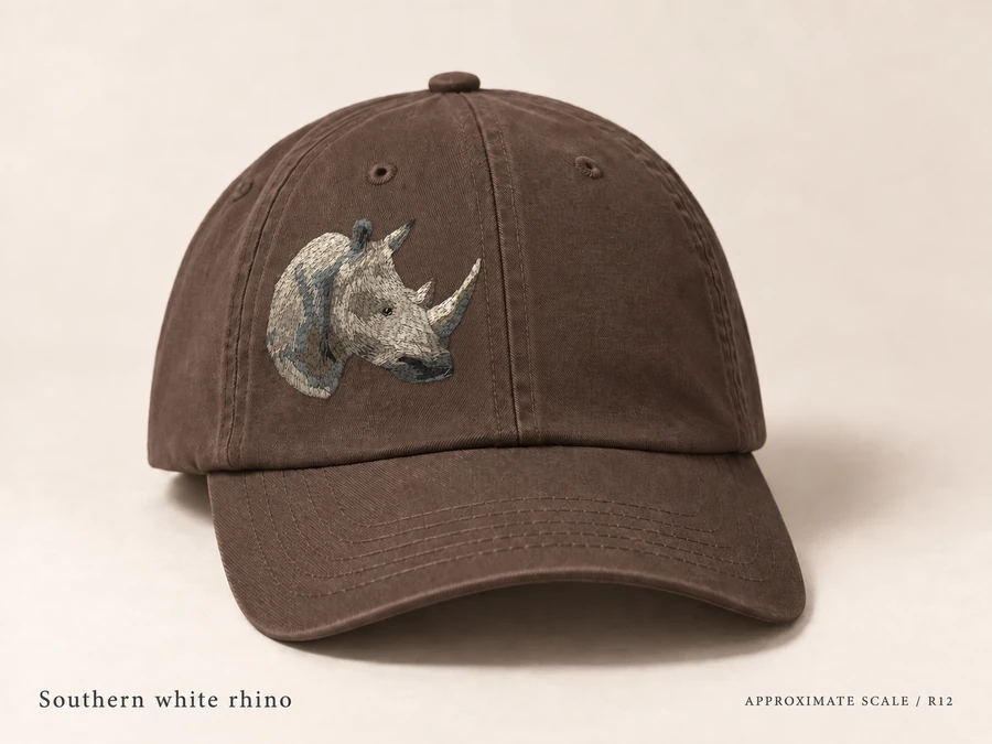 Earlier illustrative Southern white rhino cap study; superseded design